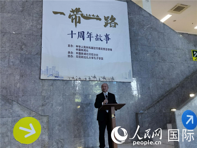 中国新闻社总编辑张明新在致辞。人民网记者 李培松摄